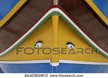 "Luzzu, typical fishing boat with painted eyes, Marsaxlokk, Malta, Europe" View Large Photo Image Stock Image - "Luzzu, typical fishing boat with painted eyes, Marsaxlokk, Malta, Europe". Fotosearch