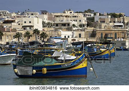 "Luzzus, typical fishing boats with painted eyes, port of Marsaxlokk, Malta, Europe" View Large Photo Image Stock Photograph - "Luzzus, typical fishing boats with painted eyes, port of Marsaxlokk, Malta, Europe". Fotosearch