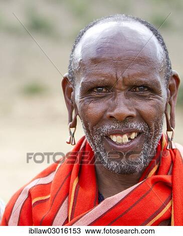 "Maasai man wearing traditional dress, portrait, Massai Mara, Distrikt Narok, Serengeti, Rift Valley province, Kenya, Africa" View Large Photo Image Stock Image - "Maasai man wearing traditional dress, portrait, Massai Mara, Distrikt Narok, Serengeti, Rift Valley province, Kenya, Africa". Fotosearch