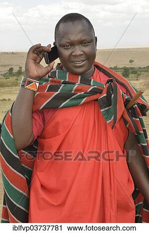 "Maasai on the phone, Massai Mara, Enkutoto, Serengeti, Rift Valley province, Kenya, Africa" View Large Photo Image Stock Image - "Maasai on the phone, Massai Mara, Enkutoto, Serengeti, Rift Valley province, Kenya, Africa". Fotosearch