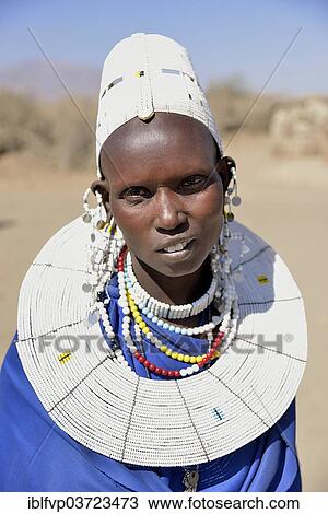 "Maasai woman wearing traditional clothes, Ngorongoro Conservation Area, Ndema, Tanzania, Africa" View Large Photo Image Stock Image - "Maasai woman wearing traditional clothes, Ngorongoro Conservation Area, Ndema, Tanzania, Africa". Fotosearch