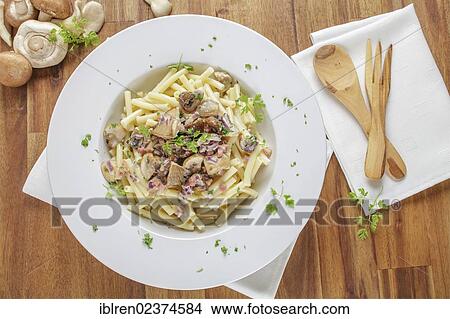 Macaroni pasta in a creamy sauce View Large Photo Image Picture - Macaroni pasta in a creamy sauce. Fotosearch