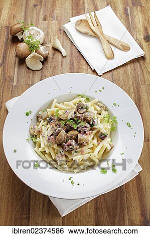 Macaroni pasta in a creamy sauce View Large Photo Image Stock Photograph - Macaroni pasta in a creamy sauce. Fotosearch