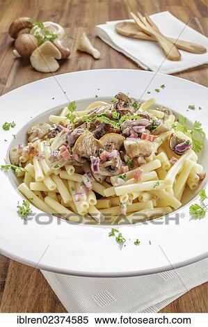 Macaroni pasta in a creamy sauce View Large Photo Image Stock Photography - Macaroni pasta in a creamy sauce. Fotosearch