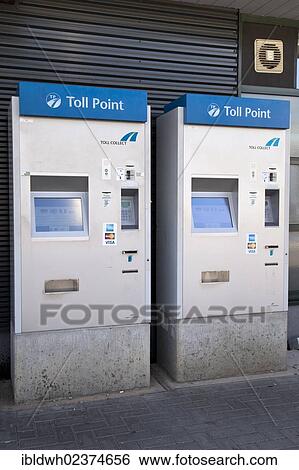 Stock Photograph - "Machines to pay the motorway tolls, toll point, toll collect, Wasserbillig Cavestellux motorway station, Rhineland-Palatinate, Germany, Europe, PublicGround, Europe". Fotosearch
