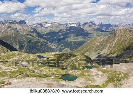 "Macun lake plateau, view from the Fuorcla da Barcli, 2850m, Swiss National Park, Graubunden, Switzerland, Europe" View Large Photo Image Stock Image - "Macun lake plateau, view from the Fuorcla da Barcli, 2850m, Swiss National Park, Graubunden, Switzerland, Europe". Fotosearch