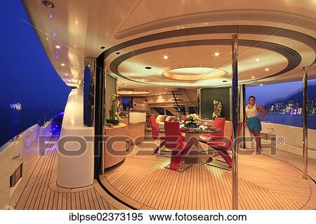 "Main deck at dusk, Leonardo II, a cruiser built by Azimut, type of boat: Leonardo 98, length: 30. 15 m, built in 2004, French Riviera, France, Mediterranean Sea, Europe" View Large Photo Image Stock Photography - "Main deck at dusk, Leonardo II, a cruiser built by Azimut, type of boat: Leonardo 98, length: 30. 15 m, built in 2004, French Riviera, France, Mediterranean Sea, Europe". Fotosearch