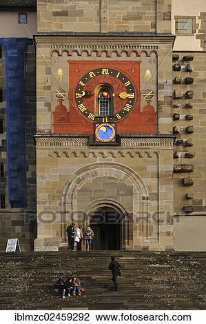 Stock Image - "Main entrance with clock tower of the late Gothic Church of St. Michael, built in 1427, the grand staircase was added in 1507, Marktplatz square, Schwaebisch Hall, Baden-Wuerttemberg, Germany, Europe, PublicGround, Europe". Fotosearch