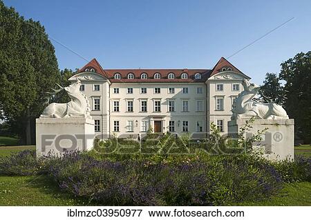 "Main facade and grounds of Schloss Wedendorf Castle, built in 1679, rebuilt in the neo-classical style in 1810, now a hotel, two deer sculptures at the front, Wedendorf, Mecklenburg-Western Pomerania, Germany, Europe" View Large Photo Image Stock Photo - "Main facade and grounds of Schloss Wedendorf Castle, built in 1679, rebuilt in the neo-classical style in 1810, now a hotel, two deer sculptures at the front, Wedendorf, Mecklenburg-Western Pomerania, Germany, Europe". Fotosearch