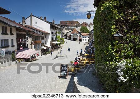 "Main street in the medieval village of Gruyeres, Fribourg, Switzerland, Europe" View Large Photo Image Stock Image - "Main street in the medieval village of Gruyeres, Fribourg, Switzerland, Europe". Fotosearch