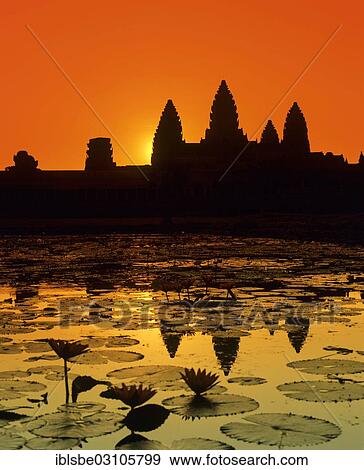 "Main temple of Angkor Wat reflected in a lotus pond, silhouette at sunrise, UNESCO World Cultural Heritage Site, Siem Reap, Siem Reap Province, Cambodia, Asia" View Large Photo Image Stock Photo - "Main temple of Angkor Wat reflected in a lotus pond, silhouette at sunrise, UNESCO World Cultural Heritage Site, Siem Reap, Siem Reap Province, Cambodia, Asia". Fotosearch