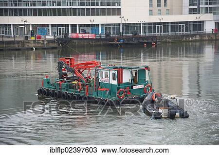 "Maintenance boat on tidal river, River Lagan, Belfast, Northern Ireland, United Kingdom, Europe" View Large Photo Image Stock Image - "Maintenance boat on tidal river, River Lagan, Belfast, Northern Ireland, United Kingdom, Europe". Fotosearch