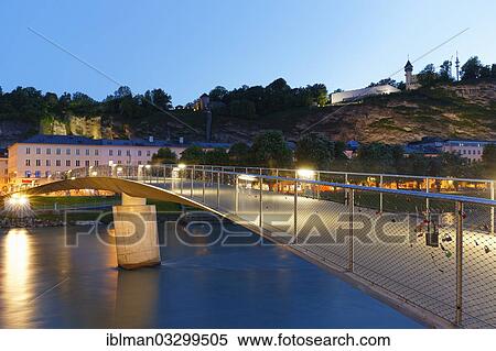 "Makartsteg brige crossing over the Salzach River, Moenchsberg mountain at the rear, Salzburg, Salzburg State, Austria, Europe" View Large Photo Image Stock Photography - "Makartsteg brige crossing over the Salzach River, Moenchsberg mountain at the rear, Salzburg, Salzburg State, Austria, Europe". Fotosearch