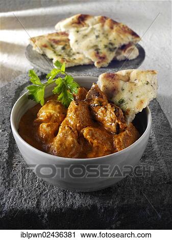 Stock Image - "Makhani, chicken curry, Indian cuisine". Fotosearch