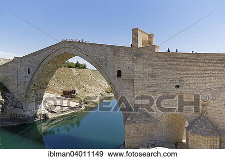 "Malabadi bridge over river or Malabadi Koprusu across Batman river, Silvan, Diyarbakir Province, Southeastern Anatolia Region, Anatolia, Turkey, Asia" View Large Photo Image Stock Photo - "Malabadi bridge over river or Malabadi Koprusu across Batman river, Silvan, Diyarbakir Province, Southeastern Anatolia Region, Anatolia, Turkey, Asia". Fotosearch