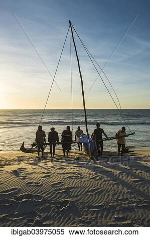 Stock Photography - "Malagasy fishermen coming back from a fishing trip, Morondava, Toliara province, Madagascar, Africa". Fotosearch