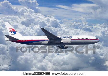 Malaysia Airlines Boeing 777-2H6ER in flight View Large Photo Image Stock Photograph - Malaysia Airlines Boeing 777-2H6ER in flight. Fotosearch