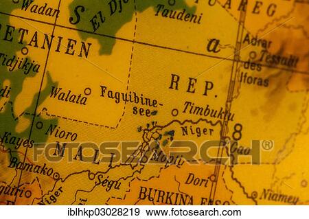 Stock Photo - "Mali, crisis region, old illuminated globe, map section, Africa". Fotosearch