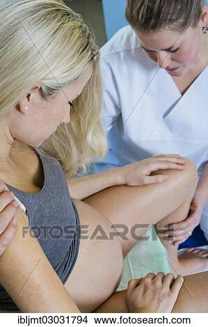 Man And Woman In The Delivery Room During Childbirth The