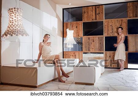 Picture - Man and woman relaxing in the relaxation area of â€‹â€‹a spa complex. Fotosearch