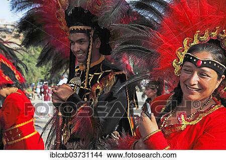 Picture - "Man and woman wearing festive traditional Indio costumes, Andacollo, Coquimbo Region, Chile, South America". Fotosearch