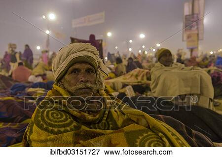 Stock Photo - "Man at Kumbha Mela grounds, Allahabad, Uttar Pradesh, India, Asia". Fotosearch