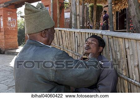 "Man being shaved by a barber in Nargakot, Nepal, Asia" View Large Photo Image Stock Image - "Man being shaved by a barber in Nargakot, Nepal, Asia". Fotosearch