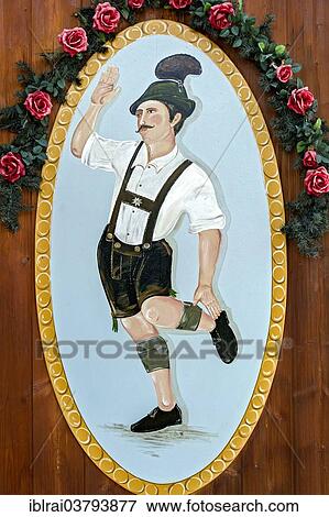 "Man dancing the Schuhplattler in Bavarian dress, painted on a wooden board, Echelsbach, Upper Bavaria, Bavaria, Germany, Europe" View Large Photo Image Stock Photo - "Man dancing the Schuhplattler in Bavarian dress, painted on a wooden board, Echelsbach, Upper Bavaria, Bavaria, Germany, Europe". Fotosearch