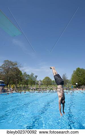 "Man diving into a public swimming pool, Moehringer Freibad, Stuttgart, Baden-Wuerttemberg, Germany, Europe" View Large Photo Image Stock Image - "Man diving into a public swimming pool, Moehringer Freibad, Stuttgart, Baden-Wuerttemberg, Germany, Europe". Fotosearch