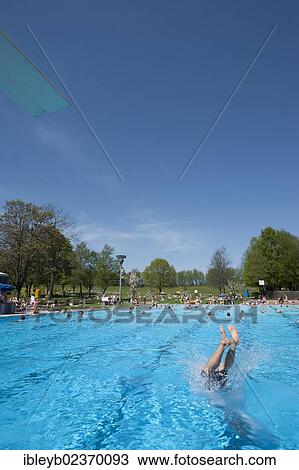 "Man diving into a public swimming pool, Moehringer Freibad, Stuttgart, Baden-Wuerttemberg, Germany, Europe" View Large Photo Image Stock Image - "Man diving into a public swimming pool, Moehringer Freibad, Stuttgart, Baden-Wuerttemberg, Germany, Europe". Fotosearch