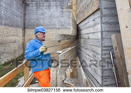 "Man doing concrete restoration and construction work on the main building of the HSG University of St. Gallen, Switzerland, Europe" View Large Photo Image Stock Photograph - "Man doing concrete restoration and construction work on the main building of the HSG University of St. Gallen, Switzerland, Europe". Fotosearch