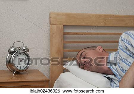 Man having a nap during the afternoon View Large Photo Image Stock Photography - Man having a nap during the afternoon. Fotosearch