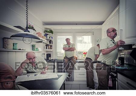 Stock Image - "Man in a kitchen, multiple exposure, Germany, Europe". Fotosearch