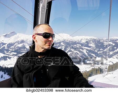 "Man in ropeway Fellhorn, Oberstdorf, Allgaeu, Bavaria, Germany, Europe" View Large Photo Image Stock Photo - "Man in ropeway Fellhorn, Oberstdorf, Allgaeu, Bavaria, Germany, Europe". Fotosearch
