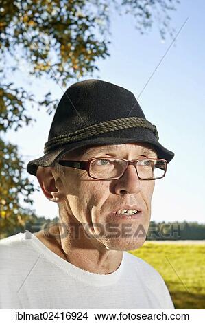 Picture - Man in the garden, portrait. Fotosearch