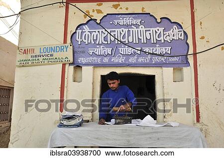 "Man ironing, laundry, Pushkar, Rajasthan, India, Asia" View Large Photo Image Stock Image - "Man ironing, laundry, Pushkar, Rajasthan, India, Asia". Fotosearch