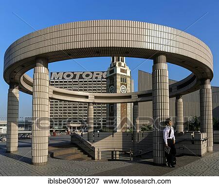 "Man leaning against a pillar on a round structure at the Cultural Centre, Kowloon Clock Tower, TST Clock Tower, Tsim Sha Tsui, Hong Kong, China, Asia, Kowloon, Hong Kong, Hong Kong, China, People's Republic of China, Asia" View Large Photo Image Stock Photo - "Man leaning against a pillar on a round structure at the Cultural Centre, Kowloon Clock Tower, TST Clock Tower, Tsim Sha Tsui, Hong Kong, China, Asia, Kowloon, Hong Kong, Hong Kong, China, People's Republic of China, Asia". Fotosearch