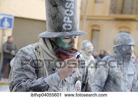 "Man lighting firecracker with a cigar, Els Enfarinats flour fight, rebels, armed with flour, eggs and firecrackers, take over the regiment of the city for one day, Plaza de la Iglesia, Ibi, Province of Alicante, Costa Blanca, Spain, Europe" View Large Photo Image Stock Image - "Man lighting firecracker with a cigar, Els Enfarinats flour fight, rebels, armed with flour, eggs and firecrackers, take over the regiment of the city for one day, Plaza de la Iglesia, Ibi, Province of Alicante, Costa Blanca, Spain, Europe". Fotosearch