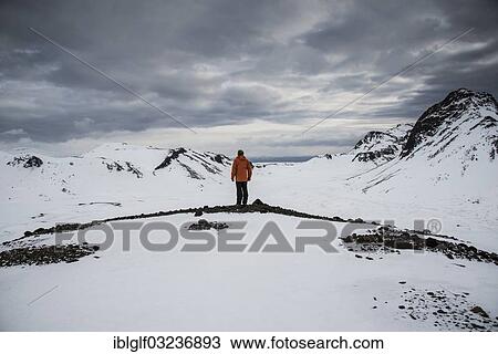 "Man looking from a lookout point over a snow-covered landscape, Langjokull, Southern Region, Iceland, Europe" View Large Photo Image Stock Image - "Man looking from a lookout point over a snow-covered landscape, Langjokull, Southern Region, Iceland, Europe". Fotosearch