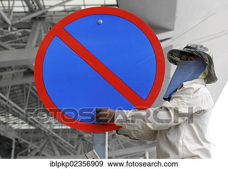 "Man mounting a no-parking sign, Chiang Mai, Thailand, Asia" View Large Photo Image Stock Photo - "Man mounting a no-parking sign, Chiang Mai, Thailand, Asia". Fotosearch