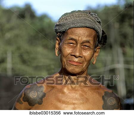 "Man of the ethnic group of the Iban, with pierced earlobes and tattoos, portrait, Skrang River, Rajang, Sarawak, Borneo, Malaysia, Asia" View Large Photo Image Stock Photograph - "Man of the ethnic group of the Iban, with pierced earlobes and tattoos, portrait, Skrang River, Rajang, Sarawak, Borneo, Malaysia, Asia". Fotosearch