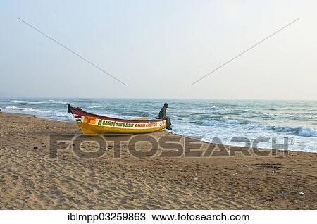 "Man on a boat on a beach, Mamallapuram, Tamil Nadu, India, Asia" View Large Photo Image Stock Image - "Man on a boat on a beach, Mamallapuram, Tamil Nadu, India, Asia". Fotosearch
