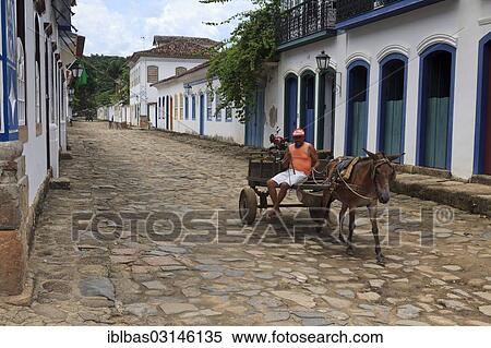 "Man on a horse cart in the historic centre, Paraty, Rio de Janeiro State, Brazil, South America" View Large Photo Image Stock Photography - "Man on a horse cart in the historic centre, Paraty, Rio de Janeiro State, Brazil, South America". Fotosearch