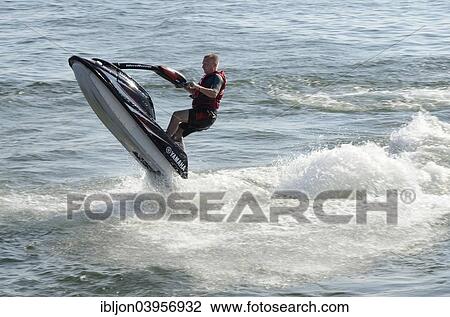 "Man on a water scooter, Ystad, Sweden, Europe" View Large Photo Image Stock Image - "Man on a water scooter, Ystad, Sweden, Europe". Fotosearch