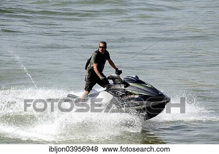 "Man on a water scooter, Ystad, Sweden, Europe" View Large Photo Image Stock Photo - "Man on a water scooter, Ystad, Sweden, Europe". Fotosearch