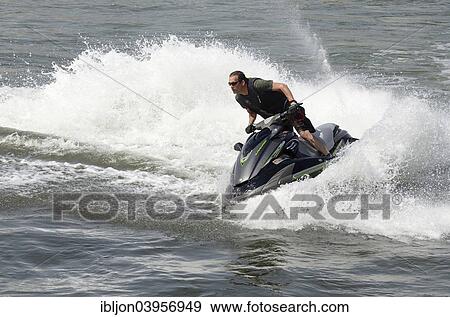 "Man on a water scooter, Ystad, Sweden, Europe" View Large Photo Image Stock Photo - "Man on a water scooter, Ystad, Sweden, Europe". Fotosearch
