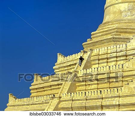 "Man on the stairs of Shwesandaw Pagoda, Buddhist stupa, Ebene von Pagan, Bagan, Mandalay Division, Myanmar, Burma, Asia" View Large Photo Image Stock Photograph - "Man on the stairs of Shwesandaw Pagoda, Buddhist stupa, Ebene von Pagan, Bagan, Mandalay Division, Myanmar, Burma, Asia". Fotosearch