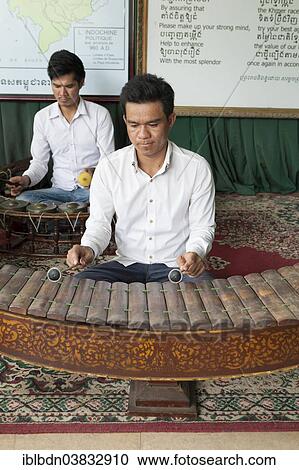 "Man playing the roneat ek, Cambodian xylophone, at the Royal Palace in Phnom Penh, Cambodia, Asia" View Large Photo Image Stock Image - "Man playing the roneat ek, Cambodian xylophone, at the Royal Palace in Phnom Penh, Cambodia, Asia". Fotosearch