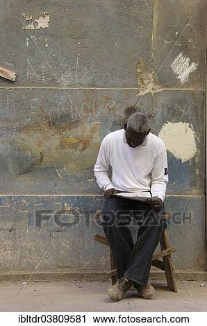 "Man reading, Old Havana, Havana, Cuba, North America" View Large Photo Image Stock Image - "Man reading, Old Havana, Havana, Cuba, North America". Fotosearch