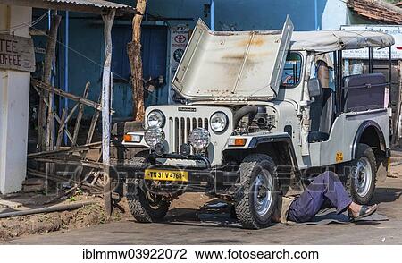 "Man repairing a jeep, Tamil Nadu, India, Asia" View Large Photo Image Stock Image - "Man repairing a jeep, Tamil Nadu, India, Asia". Fotosearch